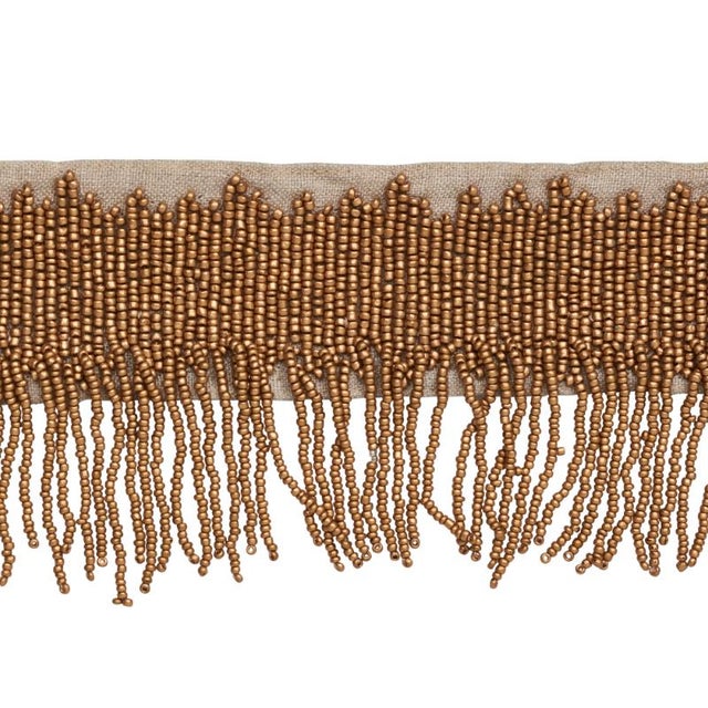 Gleaming hand beaded fringe on a linen ground makes for a glamorous statement without any flash or fuss. Sold as a 2-yard...