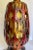 Here is a gorgeous table lamp from the mid-century featuring a pierced/cut-out design on a pottery base with an inner...