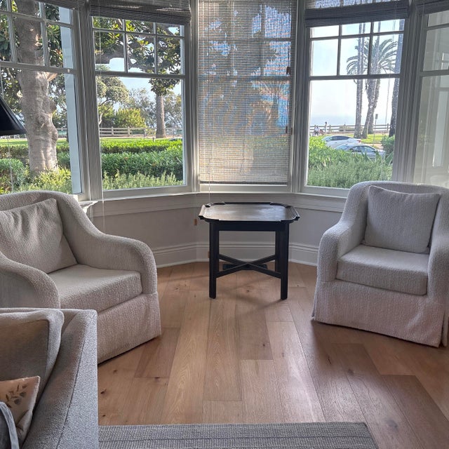 Boucle chairs that fully swivel- custom built. Commissioned directly from decorator, manufacturer not known