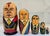 Graphic vintage set of hand-painted Russian matryoshka nesting dolls featuring late–Soviet political figures, made in...