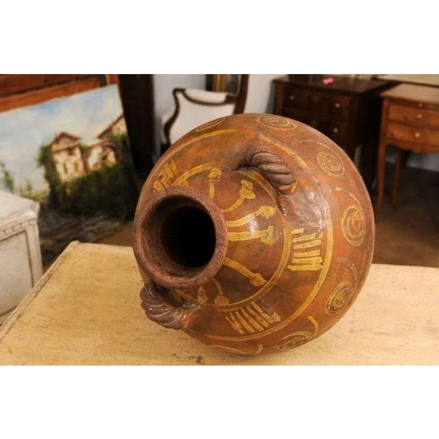 17th Century Italian Terracotta Olive Oil Jar with Yellow Glazed Spiraling Décor For Sale - Image 12 of 13