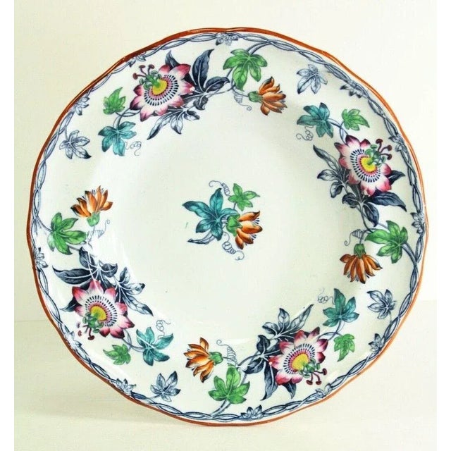 A very beautiful large and deep porcelain plate Decorated in the "Passion Flower" pattern, made by Minton & Co. between...
