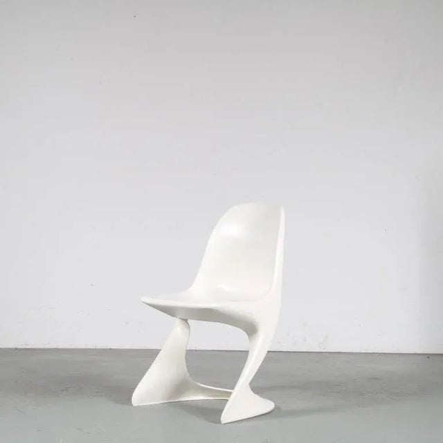 Iconic dining chairs from the “Casalino” series, designed by Alexander Begge around 1970, manufactured by Casala in...