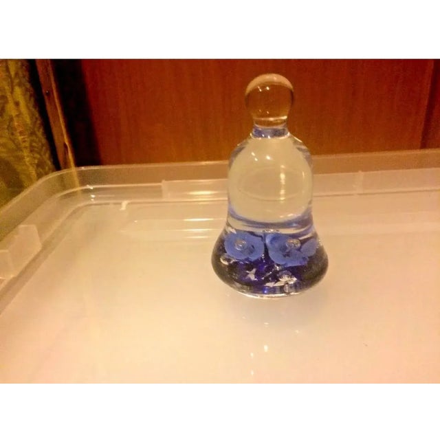 Joe St. Clair Art Glass Bell shaped paperweight Blue flowers navy and light blue On the inside- it shows the light blue...