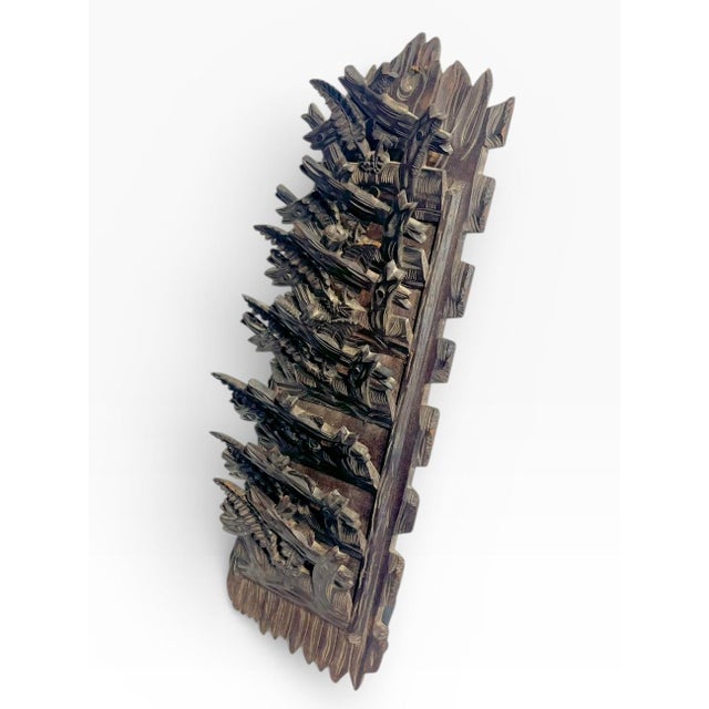 Amazing piece! Covered with intricate carved work. Each slot rests in an open position when hung. The carving is a...