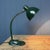 Dark green Bauhaus desk lamp from the 1930s. The lamp closely resembles the Kandem lamps of that era in terms of base,...