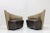 A Post Modern pair of Vladimir Kagan Bilbao swivel chairs upholstered in silk and leather circa 1990s. Enamored with...