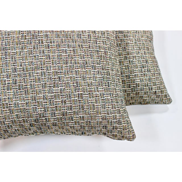 Distinctive pair of 24" by 24" custom down pillows in multi-color weave from Kravet. Pattern 35662 is a heavy cotton blend...