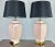 A stylish pair of deco moderne ceramic and brass table lamps in a subtle muted antique pink/coral shade. The color works...