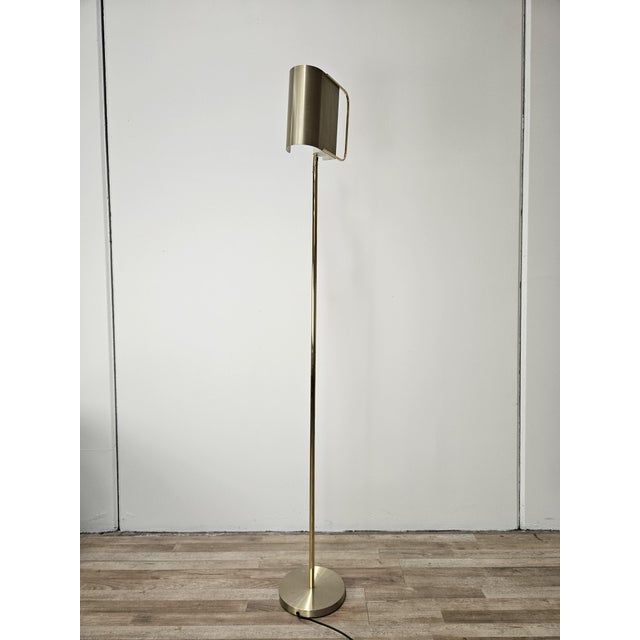 Floor lamp entirely in brass with adjustable ceiling light and power cable with push-button switch. Designer floor lamp,...