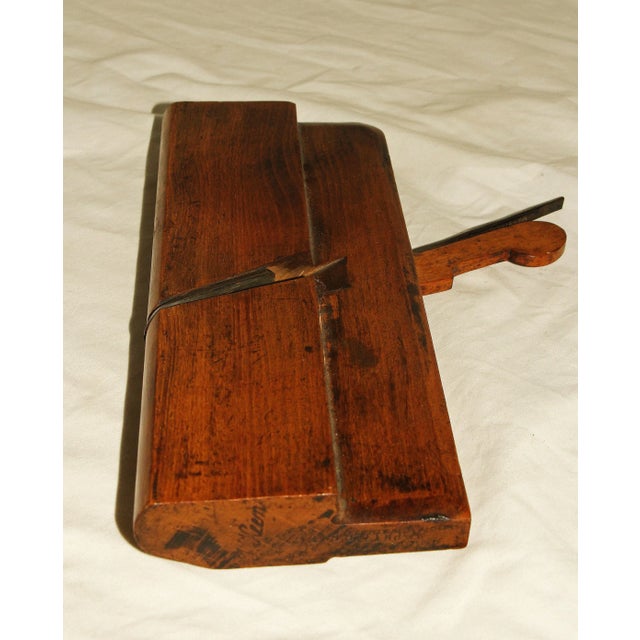 Antique molding plane stamped J.Keen (owner) and overstamped maker in Edinburgh & Glasgow. Beech. 9 1/2"w., 6"d., 1"h.