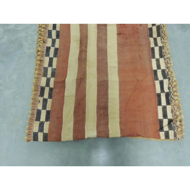 Vintage Rust and Black African Raffia Ceremonial Skirt Textile With small raffia tassels all around. Size: 33”W x 18 Feet...