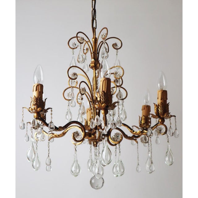 Venetian Golden Stars and Tears Chandelier, 1980s, in Very Good conditions. Designed 1920 to 1949 European Plug (up to...