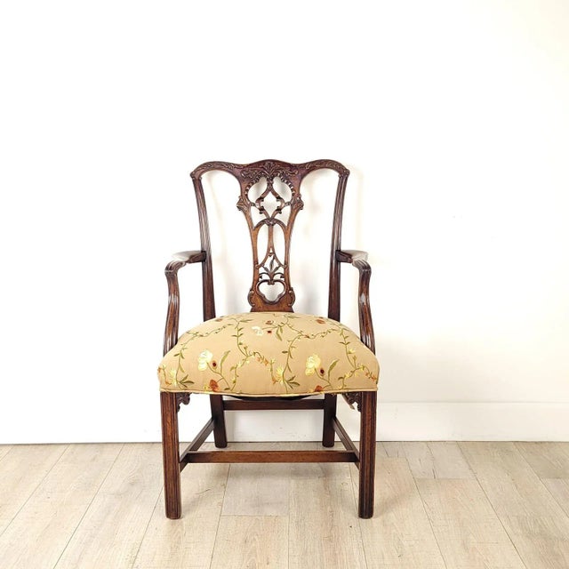 A Victorian Chippendale-style armchair. Seat height 20".