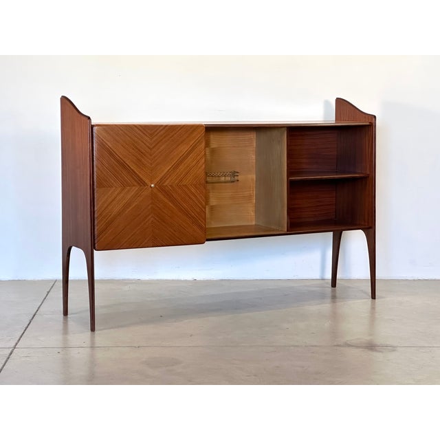 1950s wooden bar cabinet, sliding door, small glass shelf inside and brass profiles, restored