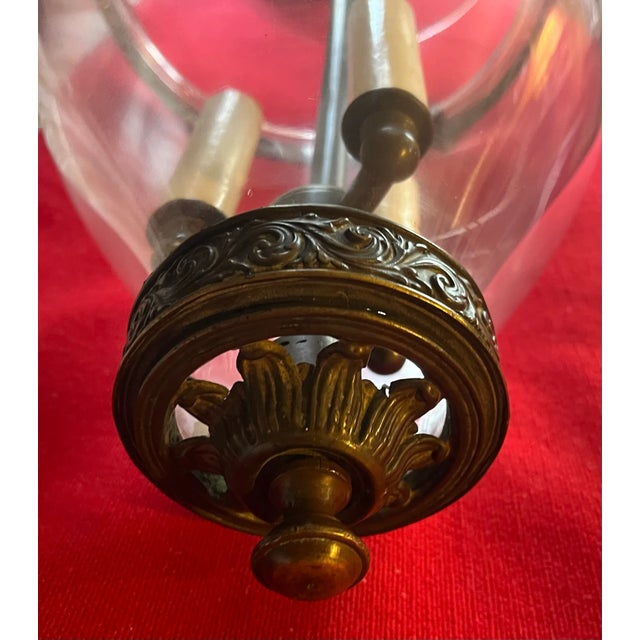 Antique 19th century bell jar hall chandelier lantern with original candle cup at the base. The blown glass hurricane...