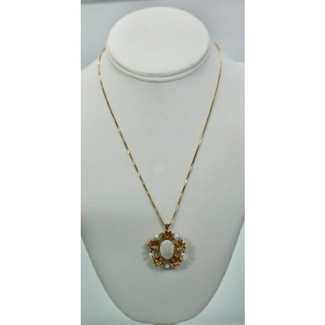 This is part of Chairish’s Fine Jewelry assortment. Opal Laurel Leaf Brooch Pendant 14K This Opal Brooch is really lovely....