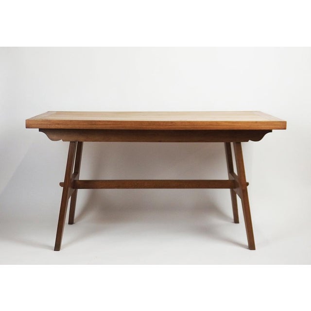 Elegant and timeless small dining table in solid oak and oak veneer, seating four or six, and also suitable as a desk....
