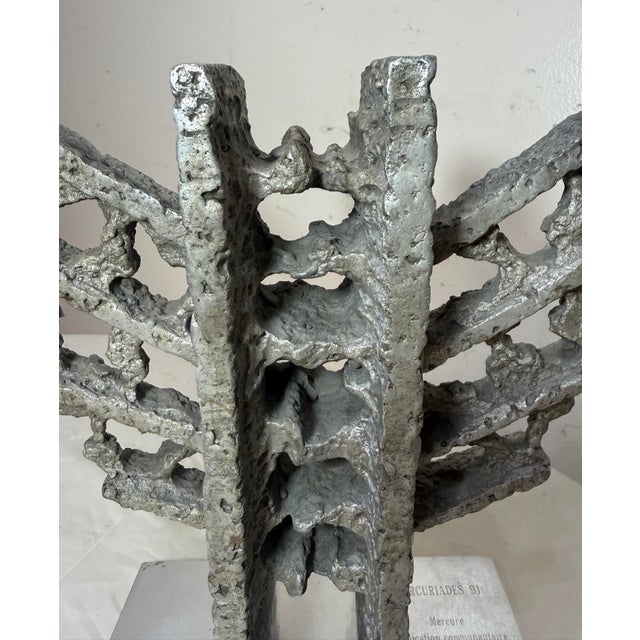 Up for sale is a wonderful vintage 1991 chromed metal brutalist statue, which serves as a presentation or award piece....