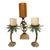 This trio of cast metal palm tree candle holders came into my life during a time when I was building something with...