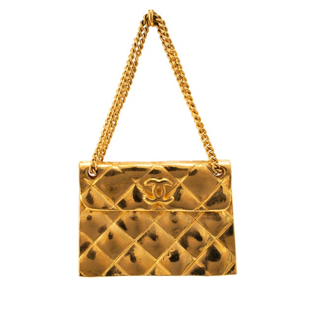 Brand: Chanel Gender: Ladies Metal Type: Gold Plated Length: 3.25 inches Width: 1.25 inches Weight: 18.04 grams CHANEL...