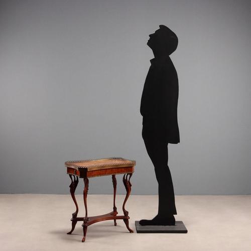 Fruitwood and rosewood coffee table. The top and lower section are inlaid with maple floral and leaf motifs, with a...