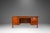 This commanding teak executive desk by Edward Wormley for Dunbar is a quintessential example of sophisticated 1950s...