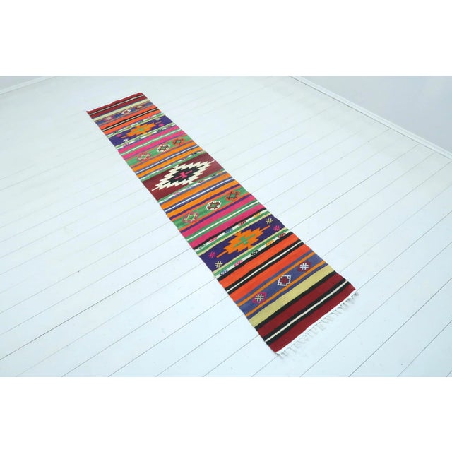 Beautiful vintage turkish kilim runner rug made pure handspun wool fringes are cotton only and dyed naturally. This beauty...
