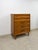 This striking vintage Heritage mid-century modern tallboy dresser is a well-made and characterful bedroom find. The...