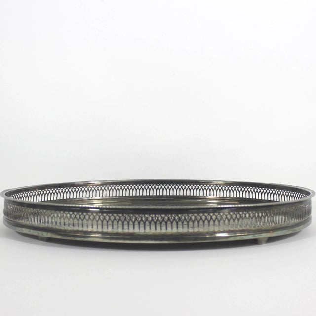 Large vintage English silver plated gallery or bar tray with gorgeous embossed detail on the base. This has a pierced...