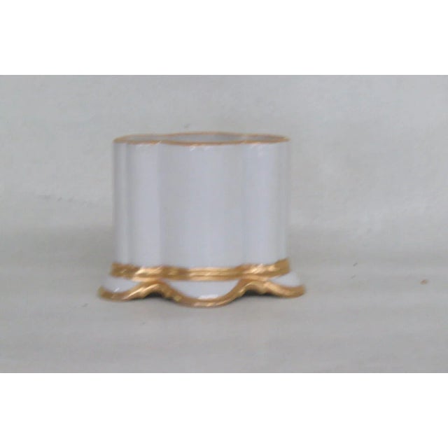 This gorgeous cigarette holder is made of porcelain. This cigarette holder is stamped as being made in West Germany, which...