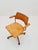 Bauhaus swivel office Armchair in solid wood By stollgiroflex 1966s The chair is in good condition Measurements: Height :...
