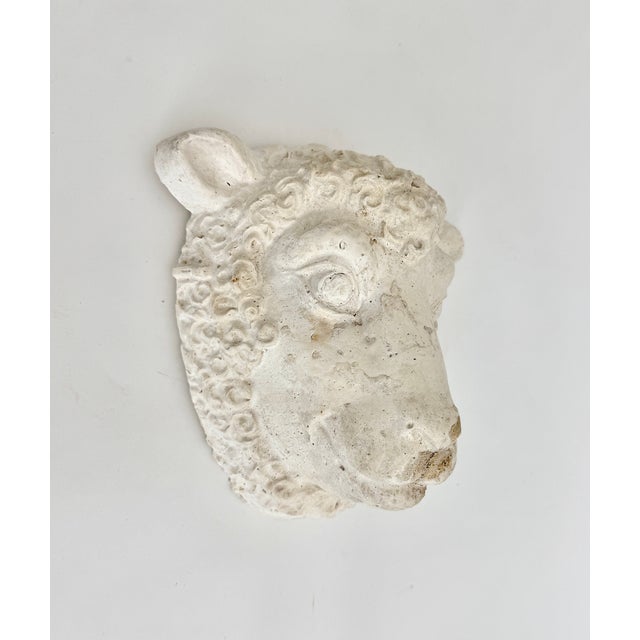 Mid-century artisan crafted sheep wall plaque sourced in France with individual detailed character in the flaws and...