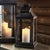 In a raw, unfinished metal, this outdoor lantern adds an industrial touch to any space. Add a selection of our LightLi...