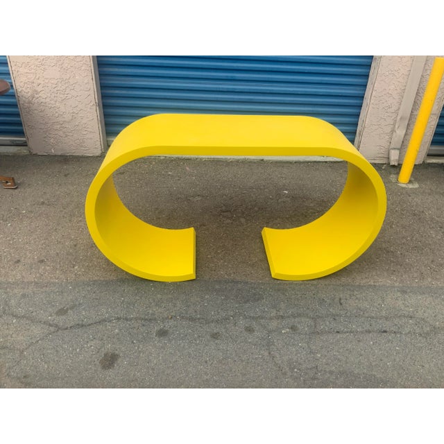 Mid century style waterfall console done in a canary yellow. Console is made of solid alder. Console has great lines and...