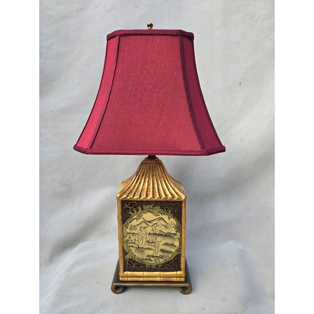 This is a pair of exquisite Japanese style lamps. They have a crackled finish with a Japanese scene. They come with these...