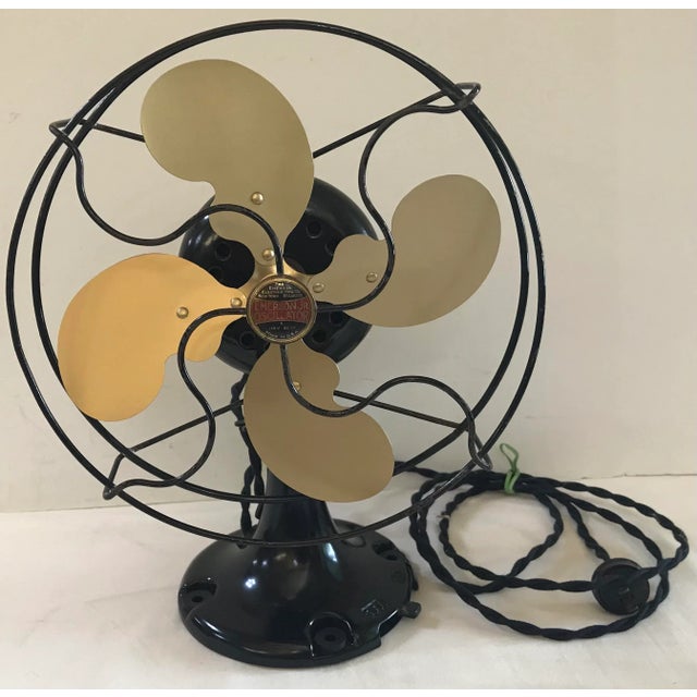 Cute little 9” Emerson Jr. electric fan. Fully restored. Red and black badge, oscillating, 4 blade. New wiring. Chairish...