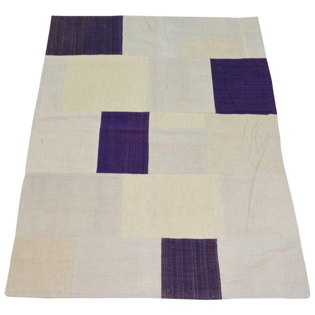 Flatweaved with care using traditional rug-making techniques, this wool rug blends timeless craftsmanship with a modern...
