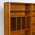 A striking teak bookcase by Poul Hundevad, produced in Denmark during the 1960s. This piece began life as the hutch top of...