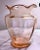 Gorgeous, hand blown, pink glass vase. Elegant design in a beautiful pink hue. It is such a pretty piece that it can be...