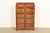 A gorgeous antique Victorian or Arts & Crafts two-door bookcase cabinet By Oliver & Co. USA, Circa 1900 Carved oak, with...