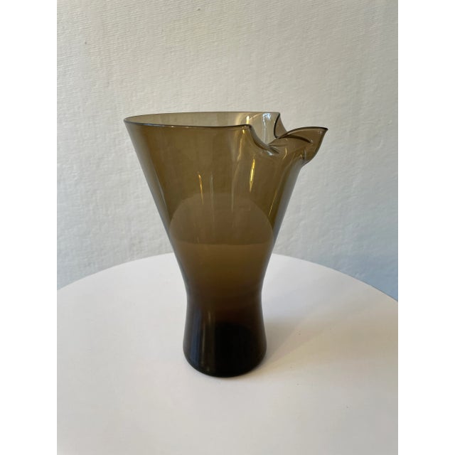 Unique mid-century modern gray smoked glass pitcher, with pinched spout. Elegant design, with narrow base.