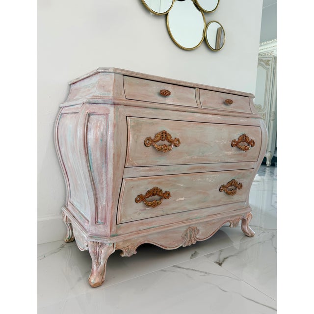 This is a beautifully refinished vintage Pulaski French-style serpentine chest of drawers, showcasing elegant curves,...