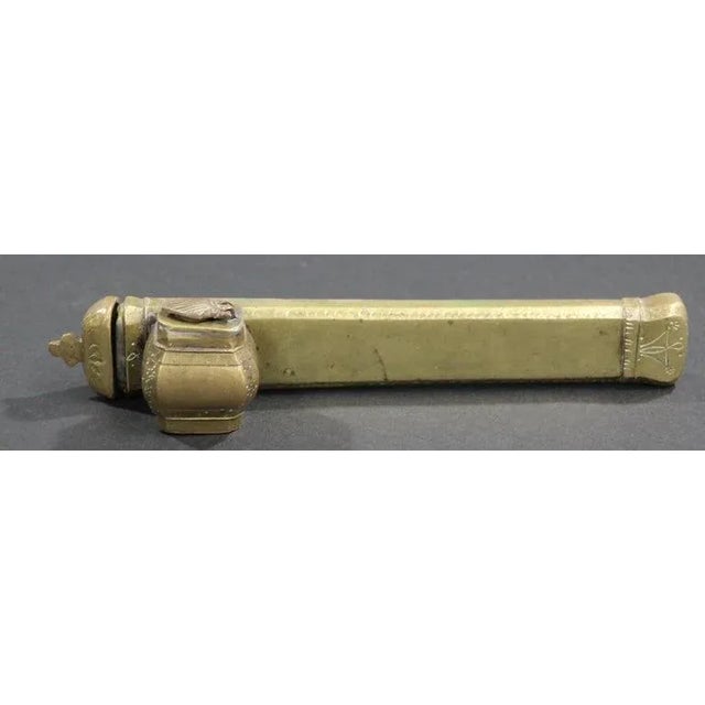 A 19th century Middle Eastern, Asian brass decorated Islamic Moorish Qalamdan. The Qalamdan is an inkwell in solid brass....