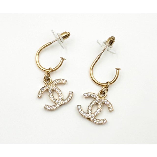 Chanel Gold CC Crystal Moscova Hoop Piercing Earrings *Marked 09 *Made in Italy *Comes with original box -Approximately...
