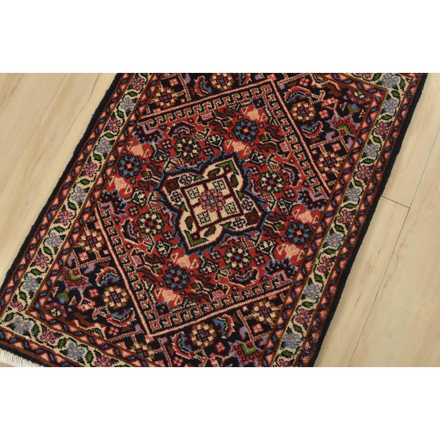 An authentic vintage traditional Bidjar rug hand-knotted with fine wool and natural dyes. This intricately woven oriental...