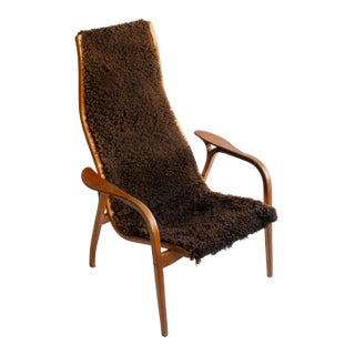 Vintage Yngve Ekström Lamino Lounge Chair for Swedese, Brown Sheepskin For Sale