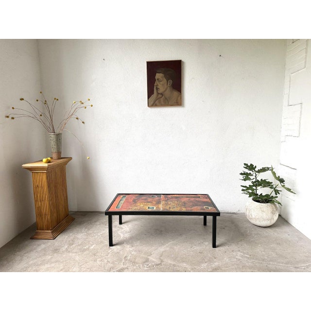 Maison Lecan presents this coffee table by Robert and Jean Cloutier, made in the 1950s, with an enameled lava top and a...