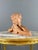Terracotta bust of a child signed d. H. Chiparus a superb terracotta bust depicting a young child holding a panpipe, a...