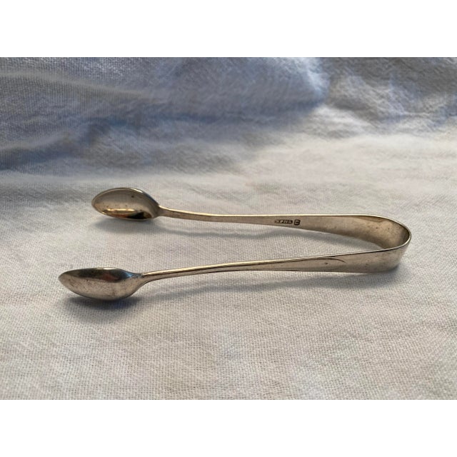Antique Silver Plate Sugar Nips / Tongs Made in England. Measures 4 1/2" X 1 1/2" X 1/4"